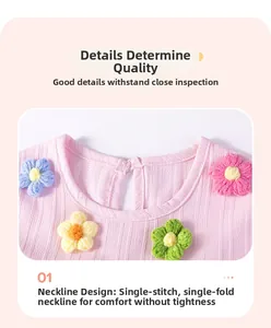 Detail of pink cotton dress neckline with colorful hand-knitted floral decorations