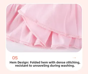 Detail of the pink girls' clothing hem with reinforced stitching for durability