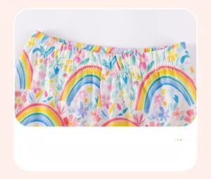 Close-up of elastic waistband on girls floral rainbow print cotton shorts or leggings