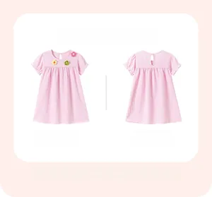Front and back view of girls' light pink summer dress with 3D floral appliques