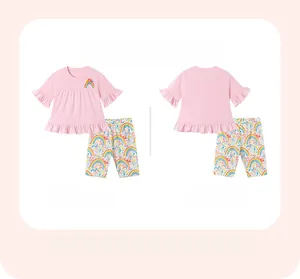 Front and back view of girls pink short sleeve set with rainbow embroidery and floral pants
