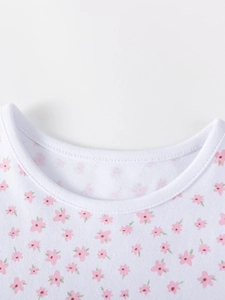 Short sleeve cotton girls dress with cute pink floral pattern and round neckline