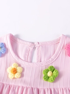 Pink girl's summer dress with colorful 3D crochet flowers and back button closure
