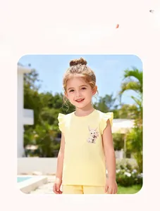 Detail of baby girl summer t-shirt with bunny print and flutter sleeves in light yellow