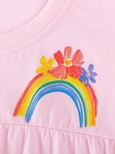 Pink cotton girls' t-shirt featuring a colorful hand-drawn rainbow and floral embroidery