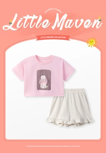 Detail view of pink cotton tee with rabbit print and grey ruffled shorts for girls aged 2-7