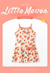 Detail of peach cotton dress with watermelon print and bright orange waist bow