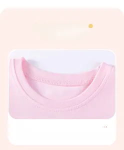 Close-up of pink cotton T-shirt showing ribbed round neckline and neat stitching details