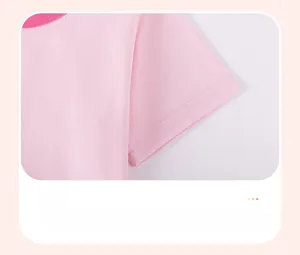 Detail of pink cotton sleeve with durable double-stitched hem and rose red binding