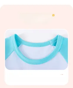 Detail view of cotton rib neck design on a blue and white raglan short sleeve t-shirt