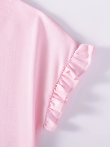Robe d'été rose pour fille en coton avec manches à volants et maille texturée