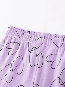 Pantalon en tricot violet pour fille avec motifs cœurs noirs et taille élastique