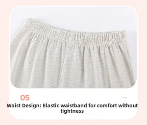 Detail of the elastic waistband on girls cotton knit shorts in heather grey