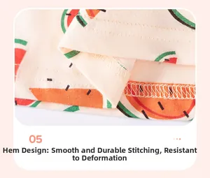 Detail view of smooth hem stitching and watermelon print on girls summer strap dress
