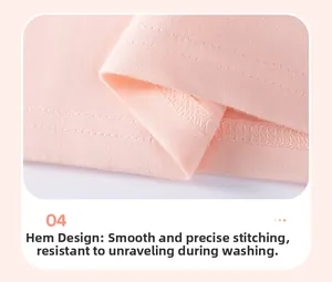 Close-up of pink cotton girl's T-shirt hem showing high-quality double-needle stitching