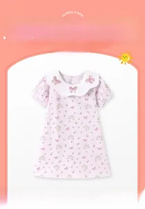 Pink cotton dress for girls featuring a white scalloped collar and cute rabbit floral print