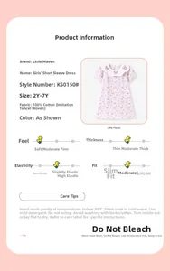 Detail of pink cotton girl dress with rabbit pattern and 100% cotton fabric label