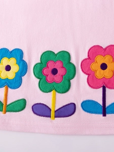 Conjunto rosa de punto de algodón para niña con vibrantes bordados de flores de colores