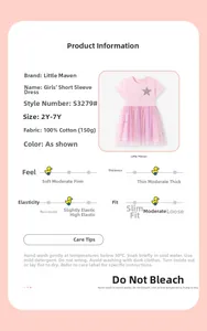 Detail of girls pink cotton dress with sparkling silver star and layered mesh skirt
