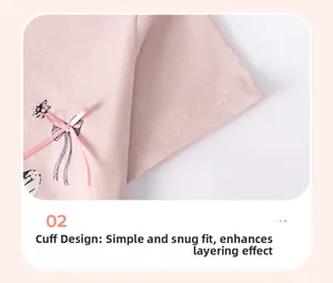 Détail de la manche d'un t-shirt rose pour fille avec couture et texture coton doux