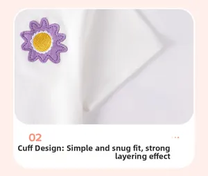 Detailed macro view of white cotton sleeve with purple daisy embroidery and stitching
