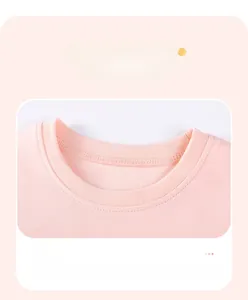 Detail of pink cotton shirt featuring a soft rib-knit neckline for ultimate comfort