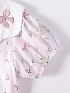 Toddler girl pink dress with bunny print, floral patterns, and bow embroidery details