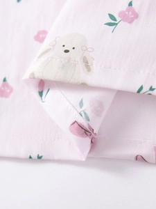 Pink cotton girls' summer dress featuring floral prints and cute puppy pattern details