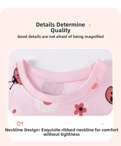 Détail du t-shirt rose pour bébé fille avec col rond côtelé et motif de coccinelle