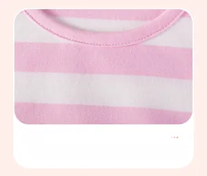 Detailed close-up of pink and white striped cotton knit crew neck collar and stitching