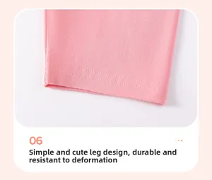 Détail de l'ensemble rose pour fille avec poignets à double couture pour durabilité
