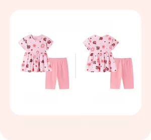 Ensemble fille rose avec t-shirt imprimé coccinelle et marguerite et legging assorti
