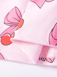 Robe rose en coton pour filles avec imprimé cerises et finitions de couture de qualité
