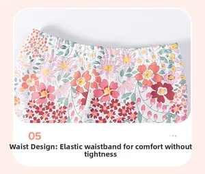 Détail du pantalon floral pour bébé montrant la taille élastique pour plus de confort