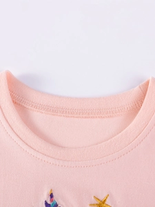 Pink cotton girls' t-shirt with detailed colorful unicorn horn and golden star embroidery