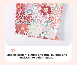 Détail de l'ourlet de short pour fille avec motif floral et coutures de précision