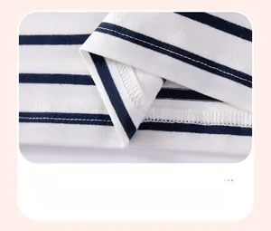 Detail of blue and white striped cotton fabric hem with durable double-needle stitching
