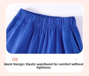 Detail of blue boys shorts showing the elastic waistband for a comfortable fit
