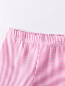 Pink and white striped cotton knit kids shorts with elastic waistband close-up view