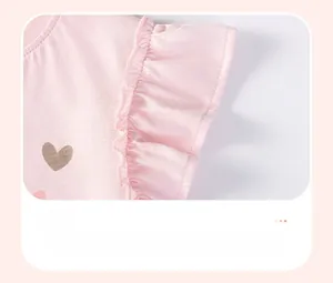 Detail of ruffle sleeve design on pink cotton knit summer t-shirt for toddler girls