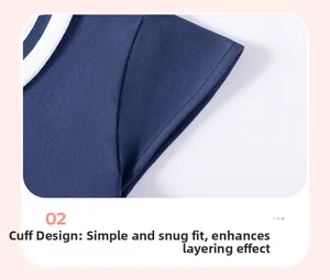 Detail of navy blue cotton girls' dress showing layered short sleeve cuff design