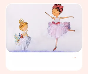 Macro detail of girls dress with ballet dancer print and white 3D mesh tutu embellishment