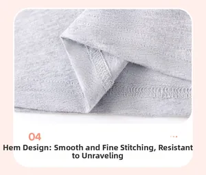 Detailed macro shot of fine double-stitched hem on grey cotton girl outfit