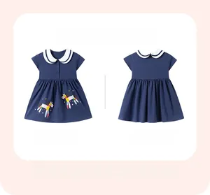 Detailed front and back view of girls navy blue dress with Peter Pan collar and pony embroidery
