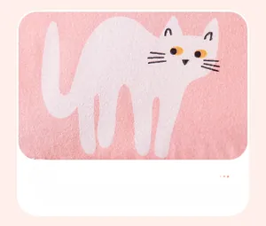 Detailed view of pink knitted fabric with cute white cat print for girls' summer outfits
