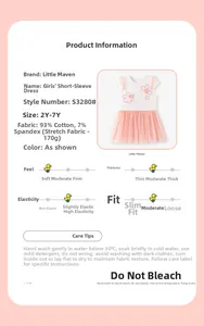 Detail of girls' cotton dress featuring pink tulle skirt and 3D flower decoration