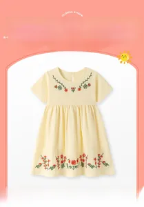 Detail of yellow cotton dress with red flower embroidery for girls aged 2-7 years