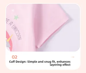 Détail d'une manche en coton rose avec imprimé licorne et ourlet à double couture