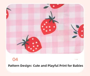 Détail du tissu vichy rose avec imprimés fraises pour robe de bébé