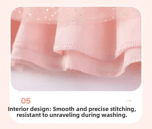 Detail of pink mesh dress lining showing neat stitching and silver sequin tulle layers